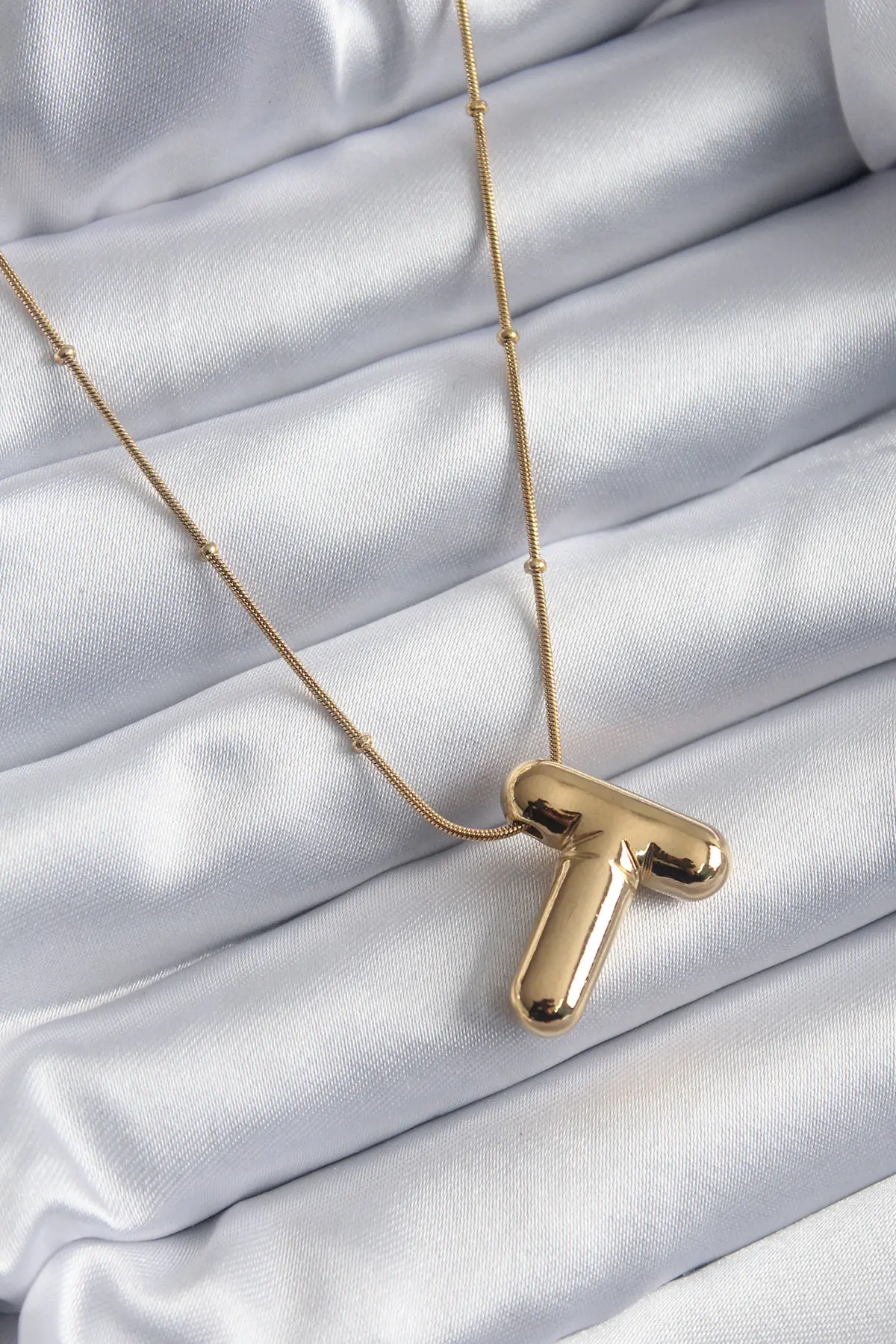 316L Çelik Gold Renk Bubble "T" Harf Model Kadın Kolye TJ-BKO7955