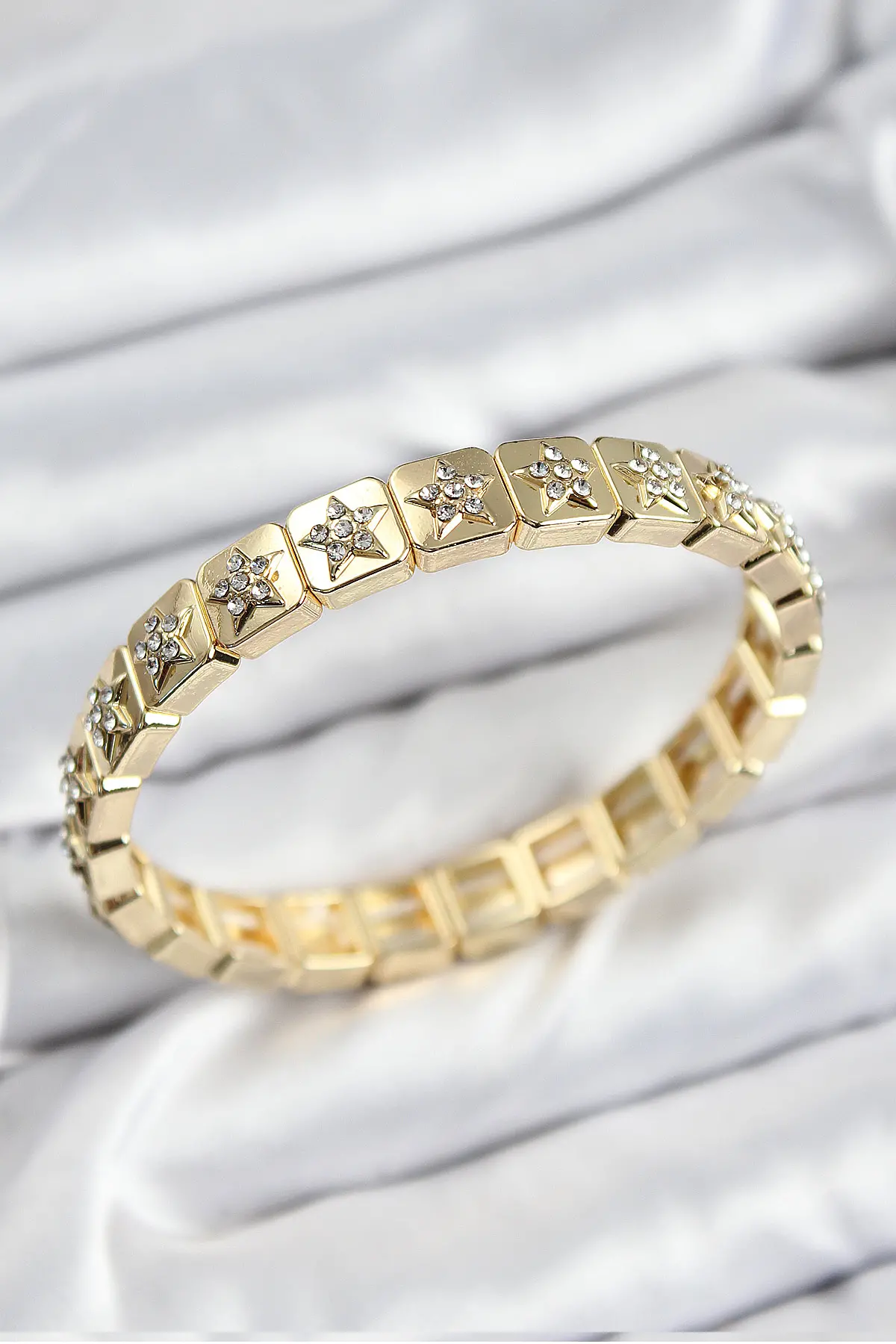 Pirinç Zirkon Taşlı Yıldız Model Gold Renk Lastikli Kadın Bileklik TJ-BB7494