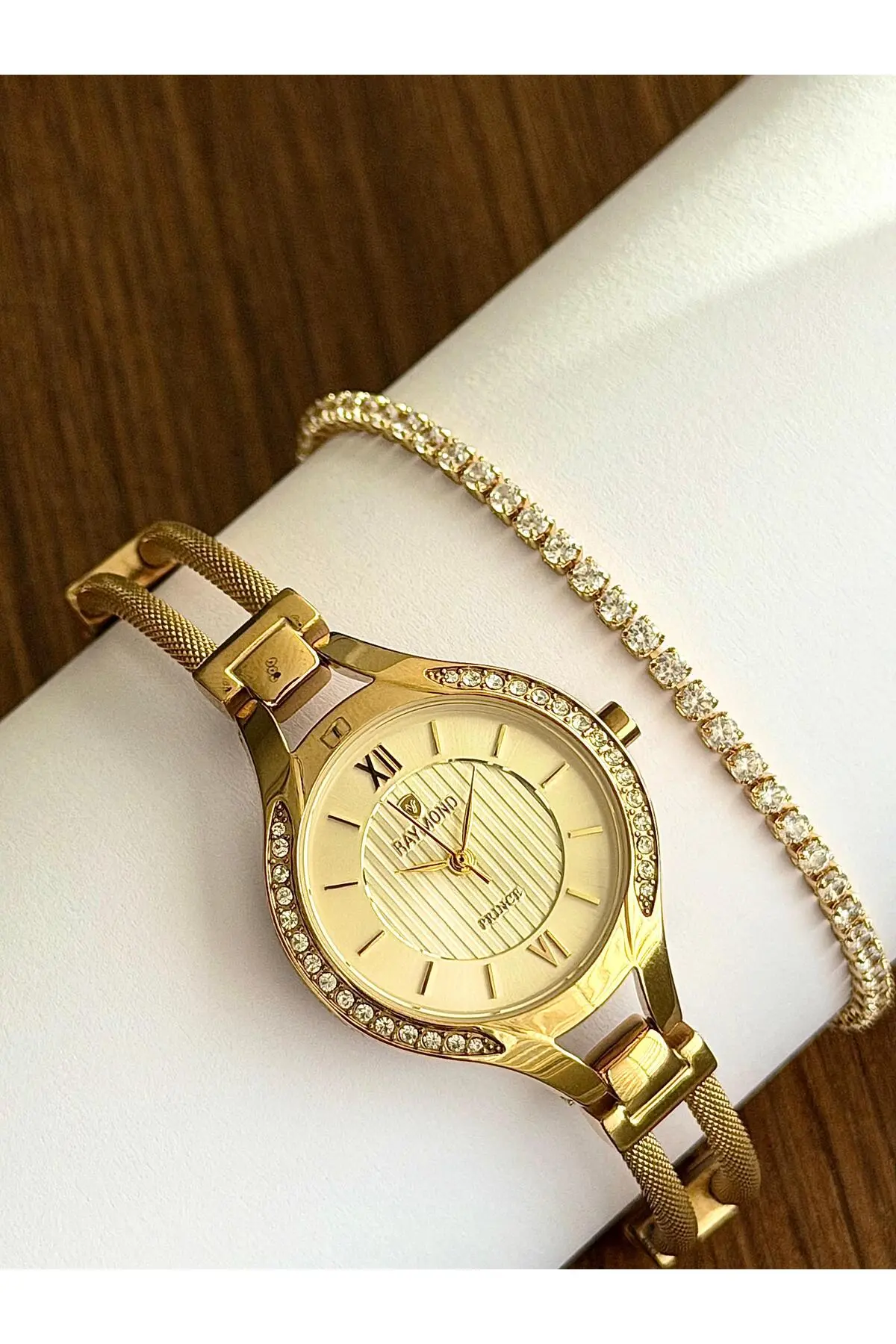 RYM-5034 QUARTZ KADIN KOL SAATİ - SU GEÇİRMEZ - ÇELİK KASA VE KORDON - 2 YIL GARANTİ GOLD