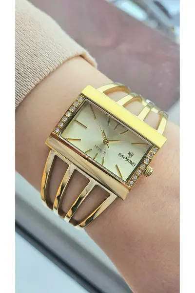 RYM-1142 QUARTZ KABURGA MODELİ KADIN KOL SAATİ - 2 YIL GARANTİ GOLD