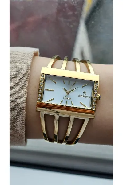 RYM-1142 QUARTZ KABURGA MODELİ KADIN KOL SAATİ - 2 YIL GARANTİ GOLD-BEYAZ
