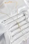 Pirinç Zirkon Taşlı Sıralı Yıldız Figürlü Y Model Gold Renk Kadın Kolye-1